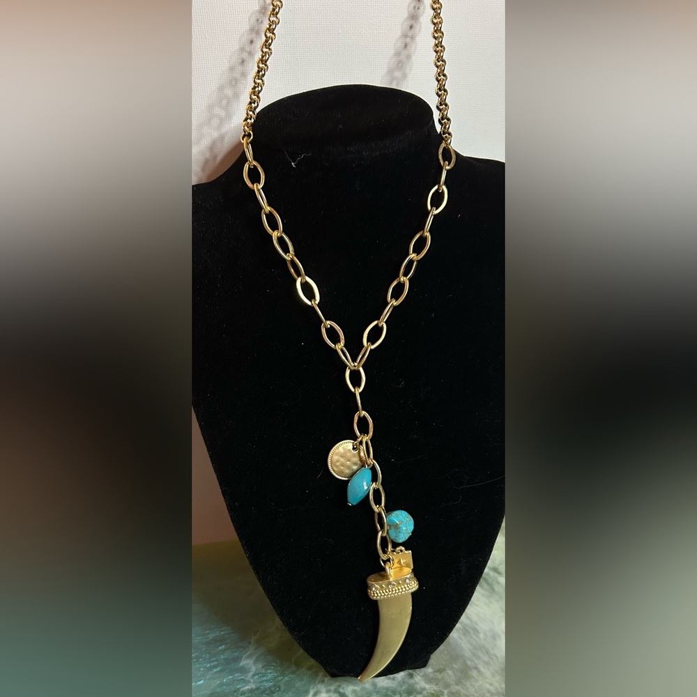 Elegant Gold Necklace with Turquoise and Charm Details